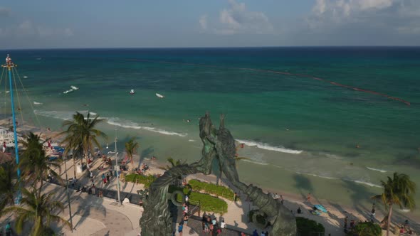 Drone Flying Around the Portal Maya Sculpture and Revealing the Sandy Beach on the Caribbean Sea