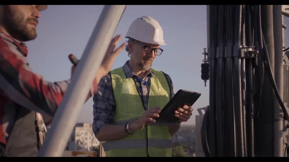 Engineers Working on 5g Antenna