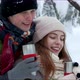 Couple Drinking Tea Coffee Cup in the Winter - VideoHive Item for Sale