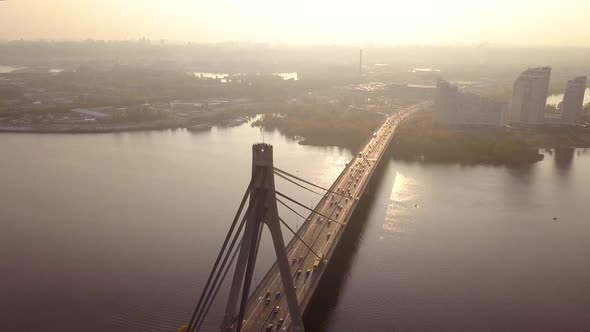 Aerial: The Pivnichniy bridge in Kiyv in autumn, sunset