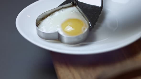 Fried Chicken Egg Shape in the Form of a Heart Put on a Plate