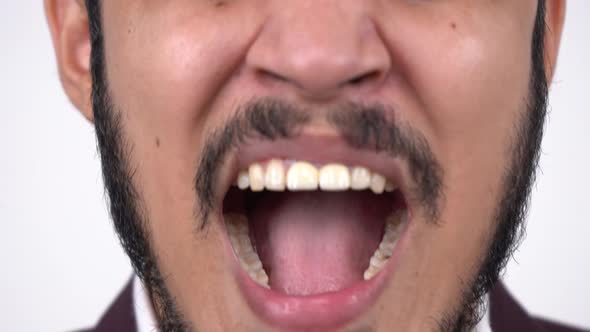 Closeup of Indian businessman shouting