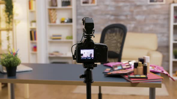 Zoom in Shot of Empty Influencer Room with Cosmetics on the Table and Professional Recording