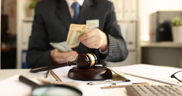 Man in Business Suit Counts Cash and Throws It Onto Judge Wooden Gavel  Movie