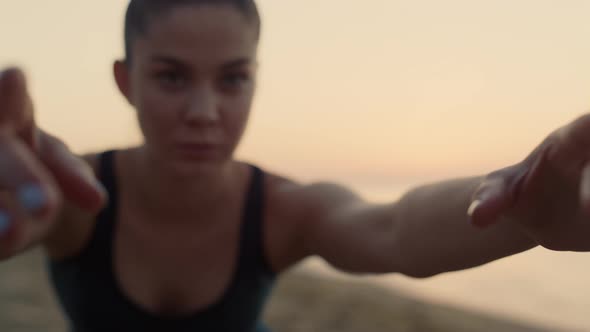 Attractive Face Sporty Girl Practicing Yoga on Beach Close Up