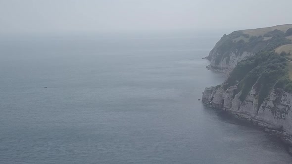 Coastal cliffs, seascape aerial footage.