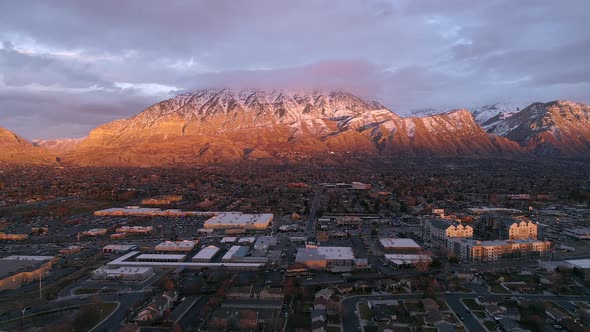 Aerial view of buildings lit up by the sun in Utah Valley