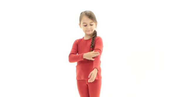 Child Advertises Clothes. White Background