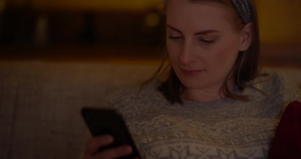 Woman Browsing Internet on Mobile Phone