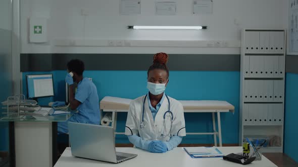 Close Up of Woman Working As Doctor in Medical Cabinet