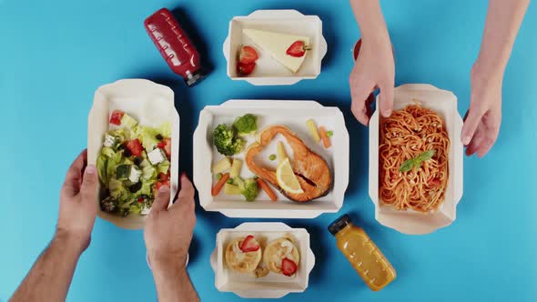 Food Delivery Top View Take Away Meals in Disposable Containers on Blue Background