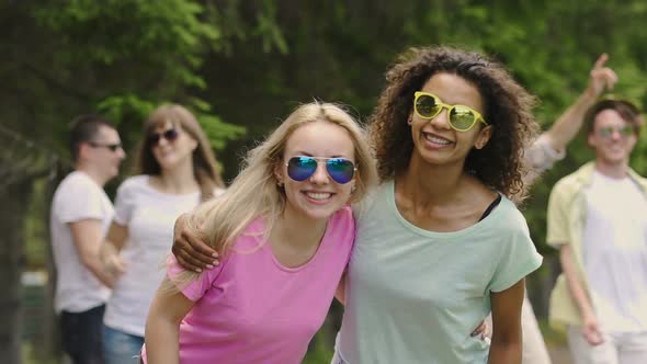 Two Cute Girls Dancing With Friends at Outdoor Party, Youth Celebrating Life