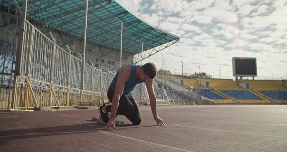 Sportsman Running From Crouch Start Position