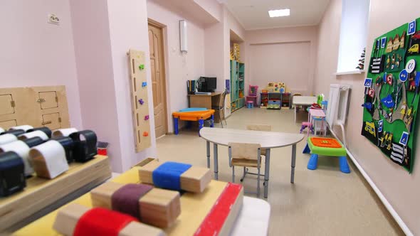 Playroom with Development Toys and Furniture in Preschool