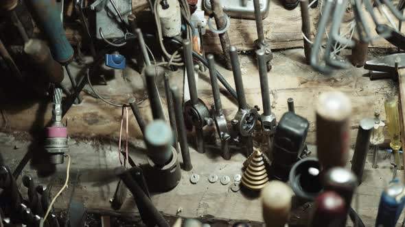 Village Workshop. A Variety of Hand Tools Are Hung on the Log Wall.