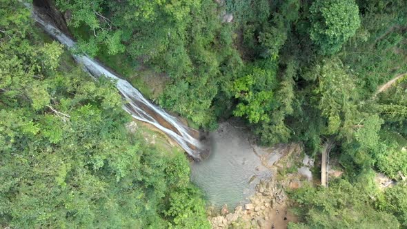 Aerial View of Waterfall cascading into pool in Cebu