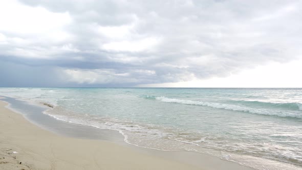 Amazing beach of Varadero Cuba during the day, background tropical storm.