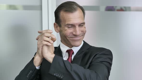 Clapping Businessman in Office, Applauding