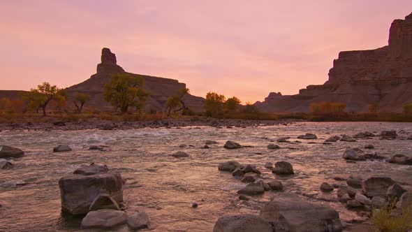 Green River flowing in slow motion as the landscape glows in Utah