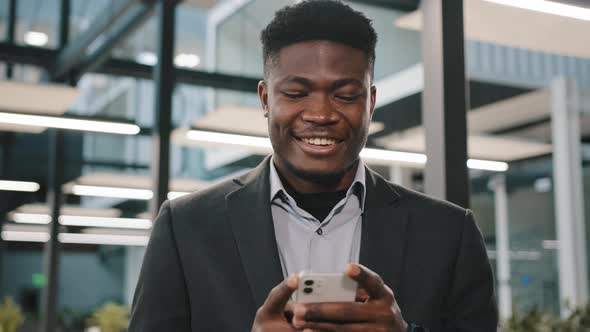 Happy Smiling African Guy American Man Businessman Boss Employee Holding Modern Wireless Device