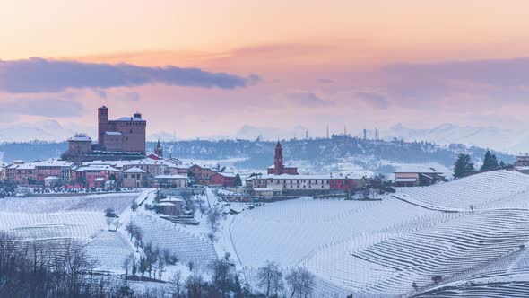 Pan: Italy Piedmont panoramic winter snow view wine yards unique landscape at sunset