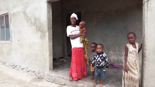 Local African Hungry Family in a Poor Village Near Slum House Zanzibar Africa