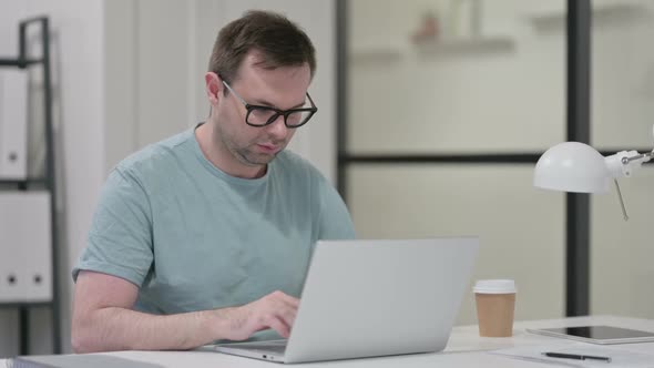 No Gesture with Finger By Young Man at Work