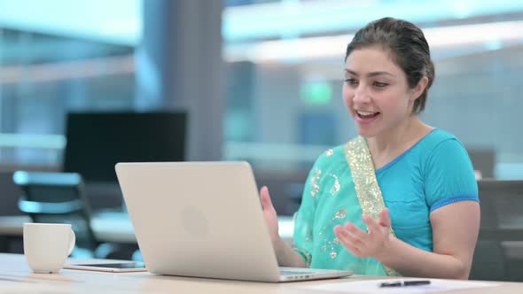 Young Indian Woman Talking on Video Call on Laptop