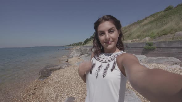 POV Shot of Young Woman Taking Selfies By The Sea - Ungraded