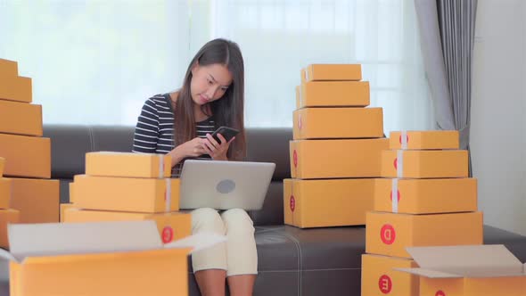 Woman with packing box ready for shipping