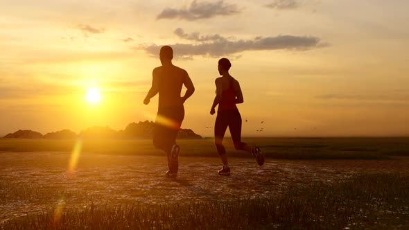 Couple Jogging At Sunset