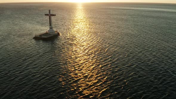 Sunken Cemetery Cross in Camiguin Island Philippines