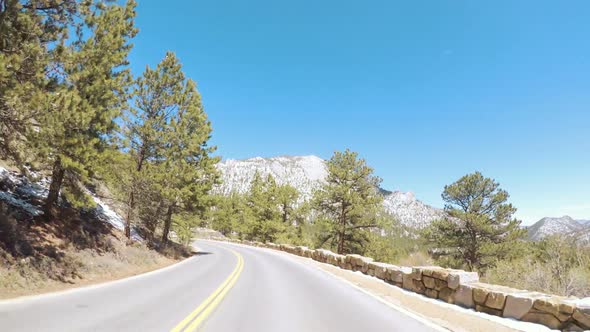 POV point of view -Driving through Rocky Mountain National Park in the Spring.