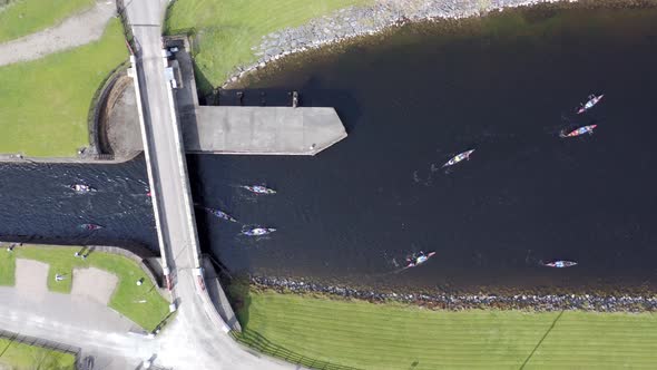 Canoeists Seen From a Bird's Eye View Crossing a Canal Lock