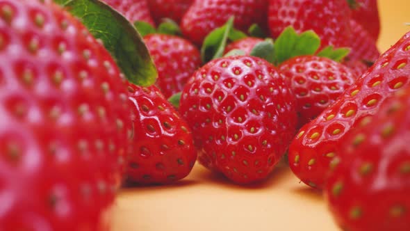 Pile of fresh strawberries on table