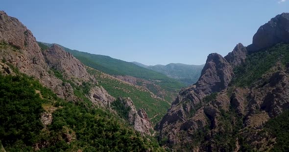 Steep Cliff Valley, Wild Rock Face & River Beneath The Oak Trees Forest In Hyrcanian UNESCO World He