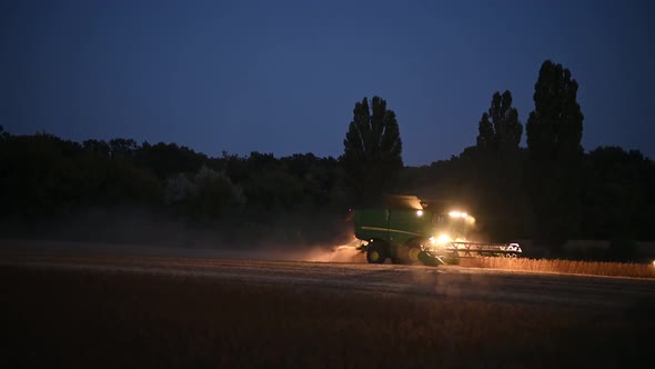 The Combine Harvests at Night