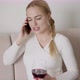 Woman with Wine Talking on Smartphone - VideoHive Item for Sale