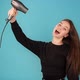 Model Brunette Sings Into Hairdryer - VideoHive Item for Sale