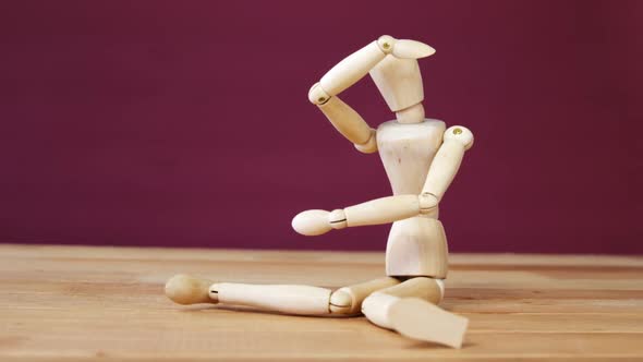 Figurine performing stretching exercise