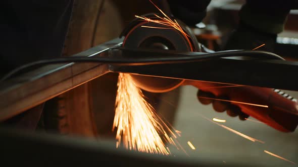 Industry Worker Grinding Metal with Angle Grinder