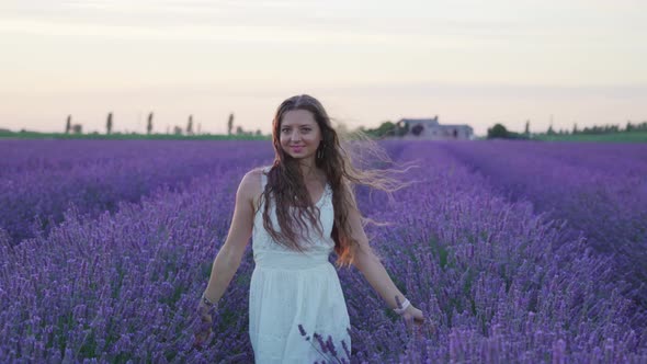 Purple Lavender Field with a Girl Dressed in White