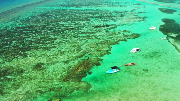 Aerial view tourism of perfect coastline beach journey by blue sea with white sandy background of ad