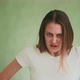 Angry Lady with Straight Hair Breathes Heavily on Green - VideoHive Item for Sale