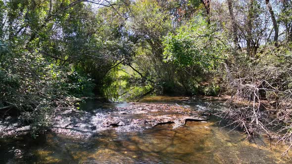 Waterfall at scenic  gorge canyons formation. Rural landscape.