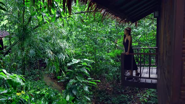 Cute Asian Girl Chilling in Front of a Treehouse in Slow Motion Thailand