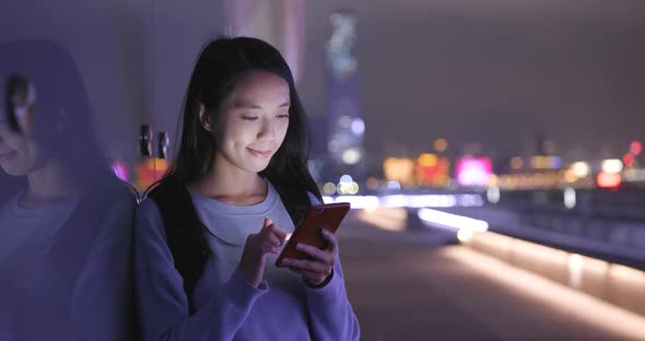 Women use of smart phone at outdoor