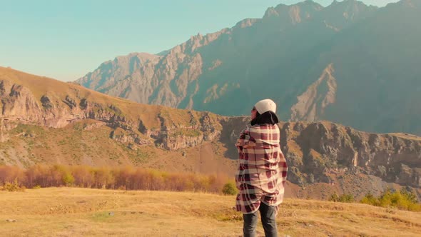 Caucasian Female Excited In Scenic Location In Kazbegi