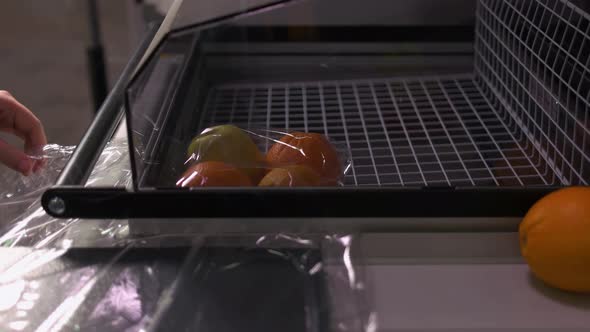 Closeup Packing Fruits Using Vacuum Seal Machine