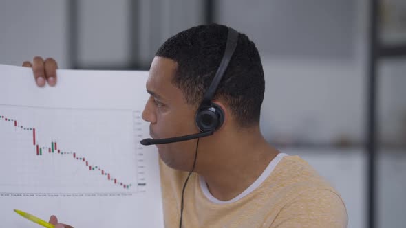 Virtual Conference POV of Anxious Dissatisfied Young Manager Pointing at Graph Talking in Slow